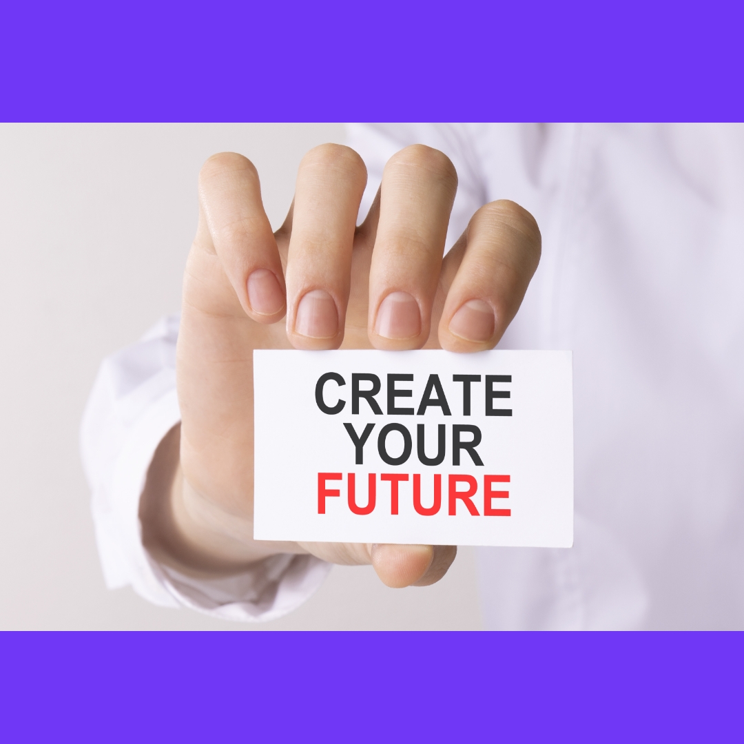 man-holding-card-with-text-create-your-future